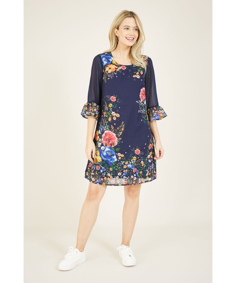 Exude total elegance in this Yumi Cluster Floral Tunic Dress. Crafted from the lightest of georgette, this relaxed tunic dress is cut to a shift shape with fluted cuffs on the long sleeves. The bright floral print placed near the neckline and hem adds a splash of colour, whilst the nape button on the back marries the piece together.  100% Polyester Machine Wash At 30