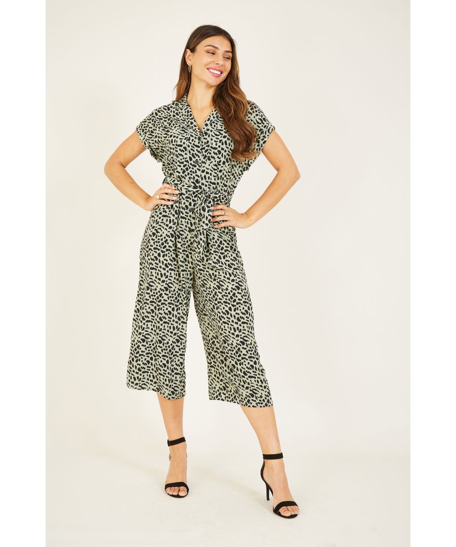 Lend your wardrobe a wild edge with this stylish Yumi Leopard Print Short Sleeve Jumpsuit. Perfect for adding a subtle print to your wardrobe, it gives a subtle nod to utilitarian style. Silky-soft satin gives a luxurious feel, balanced by a smart button front and a waist-enhancing tie. Our favourite feature is the nifty pockets on the side.