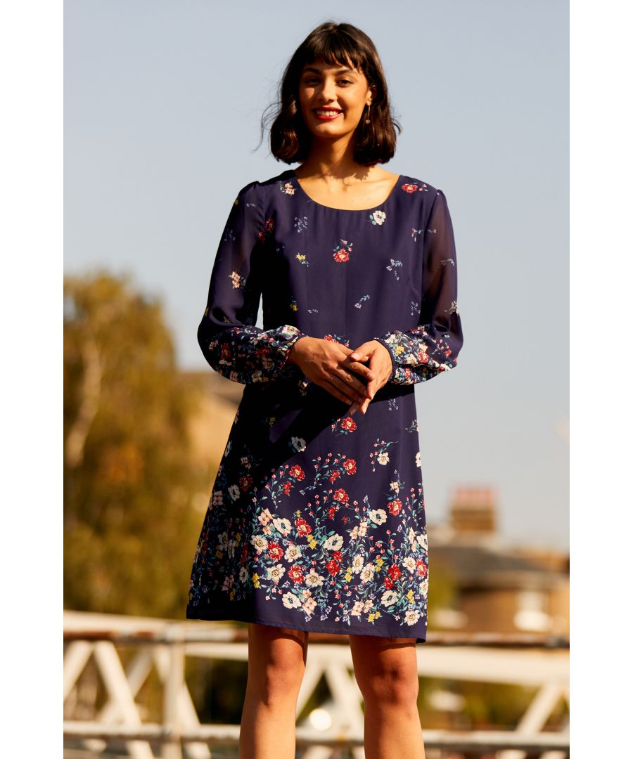 Looking for a dress that can do both formal and casual? Meet our Yumi Floral Long Sleeve Tunic Dress. Made from lightweight georgette, itâ€™s been styled in a retro tunic shape, with a soft lining underneath. The ditsy florals give it a contemporary edge, with long relaxed sleeves and a round neckline tweaking the original design.  100% Polyester Machine Wash At 30