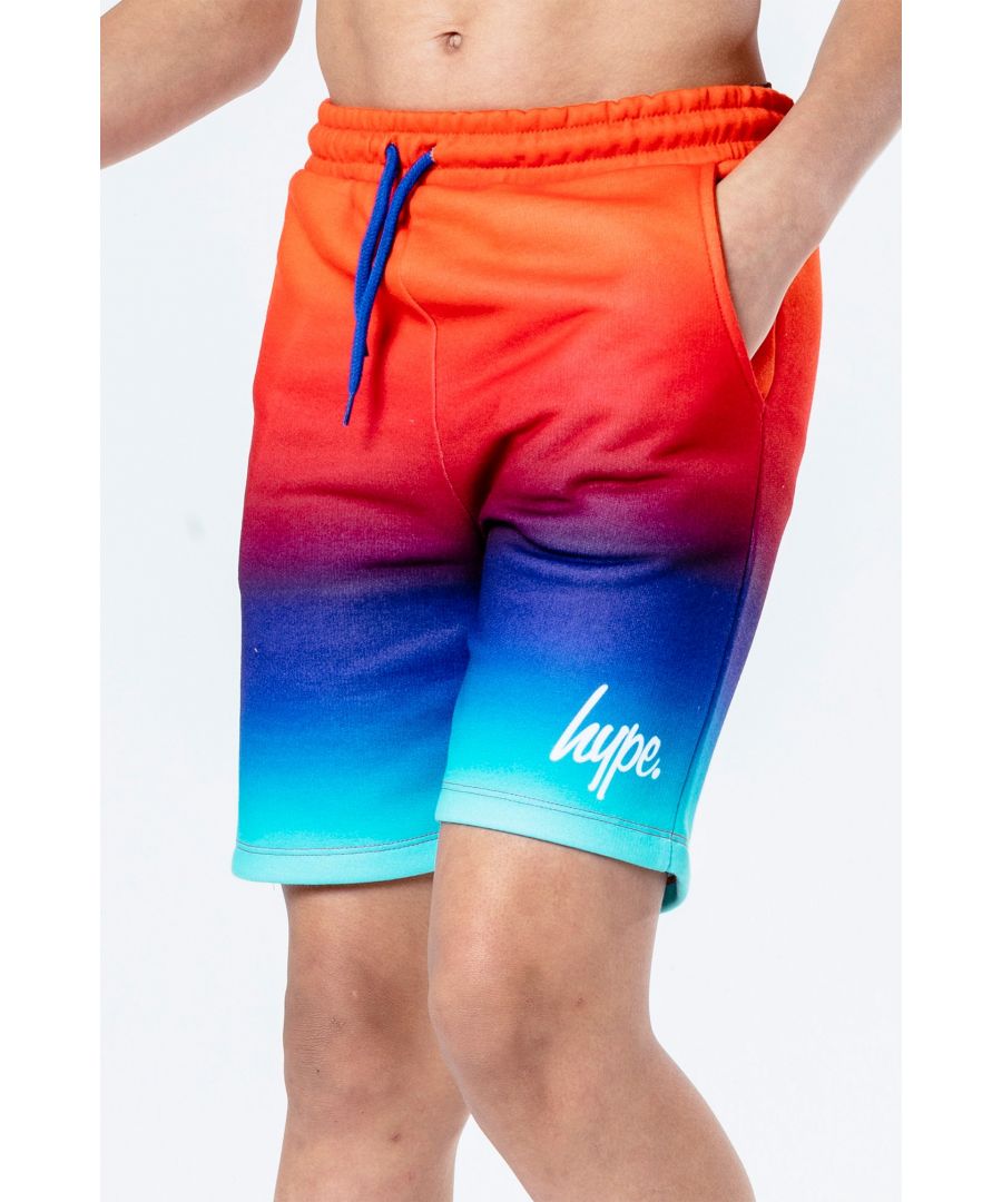 The HYPE. Mint Fade Kids Shorts features an orange, red, purple, navy and mint colour palette. In our standard kids shorts shape in a 60% polyester and 40% cotton fabric base for the ultimate comfort. Finished with an elasticated waistband, drawstring pullers and the iconic mini HYPE. script logo in a contrasting white on the front. The design features our signature all-over fade effect. Wear with the matching tee to complete the look. Machine wash at 30 degrees.