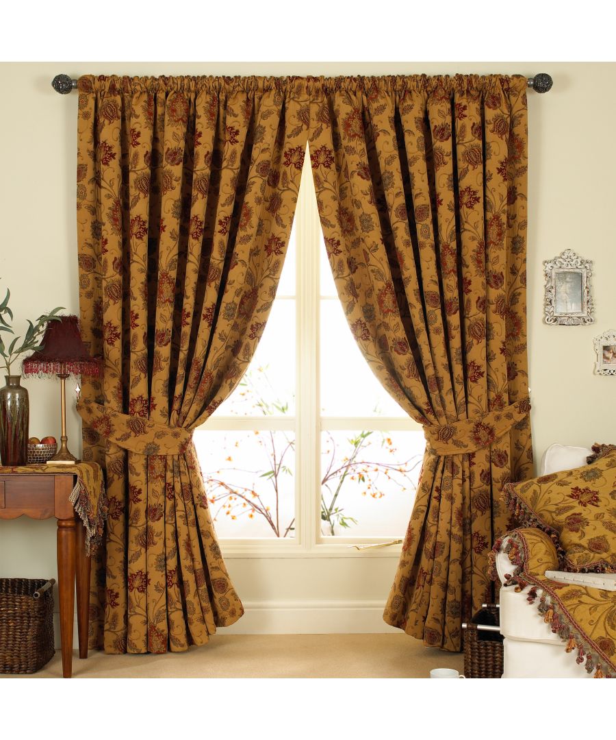 The Zurich pencil pleat curtains boast a beautifully detailed floral jacquard pattern in a range of rich colours which embodies the luxuriant style that is synonymous with traditional English interiors. Complete with fully matching tiebacks and an adjustable header. These heavyweight curtains are fully lined for decreased light penetration and heat loss. Made to match the Zurich cushions, throws and draught excluders.