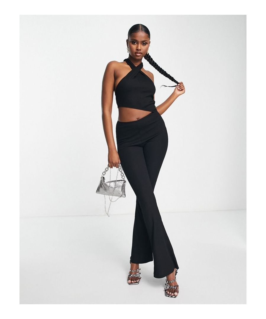 Jumpsuit by ASYOU Exclusive to ASOS Halterneck with tie fastening Sleeveless style Cut-out detail Flared leg Regular fit  Sold By: Asos