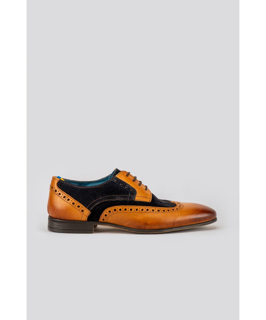 A classic Derby style shoe met with premium tan navy leather upper and lambskin lining introduces The Miles. A regular pointed toe complimented with an intricate, perforated brogue detailing makes this the ideal shoe to complete smart and sophisticated formal attire.\nOur insoles consist of extra padding, enhancing comfort, and reducing stress on the feet. An additional cellular cushion is added along the collar to further enhance comfort. Our soles are made from a flexible all-weather resin material to ensure durability without sacrificing comfort.Upper: LeatherLining: LambskinSole: Other MaterialsAll Oswin Hyde shoes come in 100% recycled packaging with complimentary storage bags, shoehorn and polish to keep your kicks looking their best.