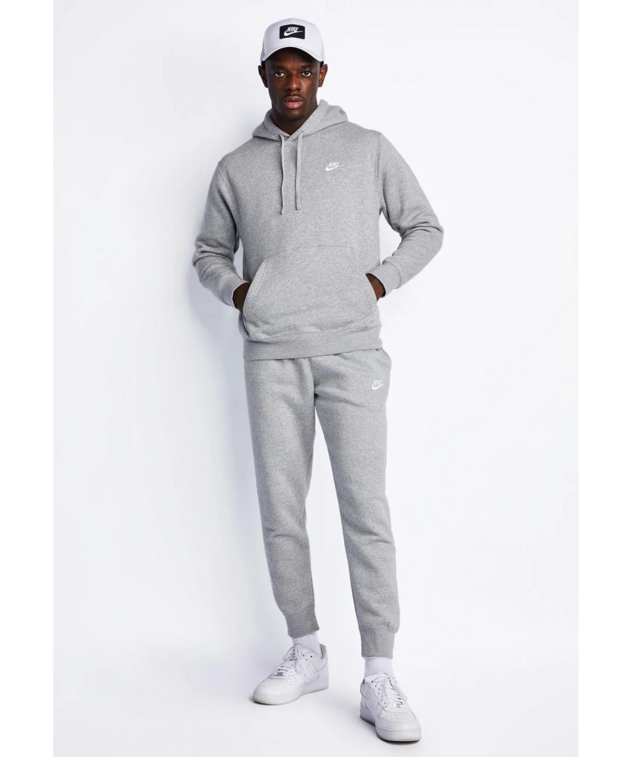Nike Mens Club Fleece Full Tracksuit.       \nPulloever Hooded Top, Nike Swoosh Embroidery to the Chest and Leg.      \nRibbed Neckline, hem and Cuffs.      \nElasticated Waist Concealed draw cord Cuffed Joggers.      \n2 Side Pockets, Single back Pocket Secured with Pressed Button.      \nSoft and Comfortable Feel Fabric.
