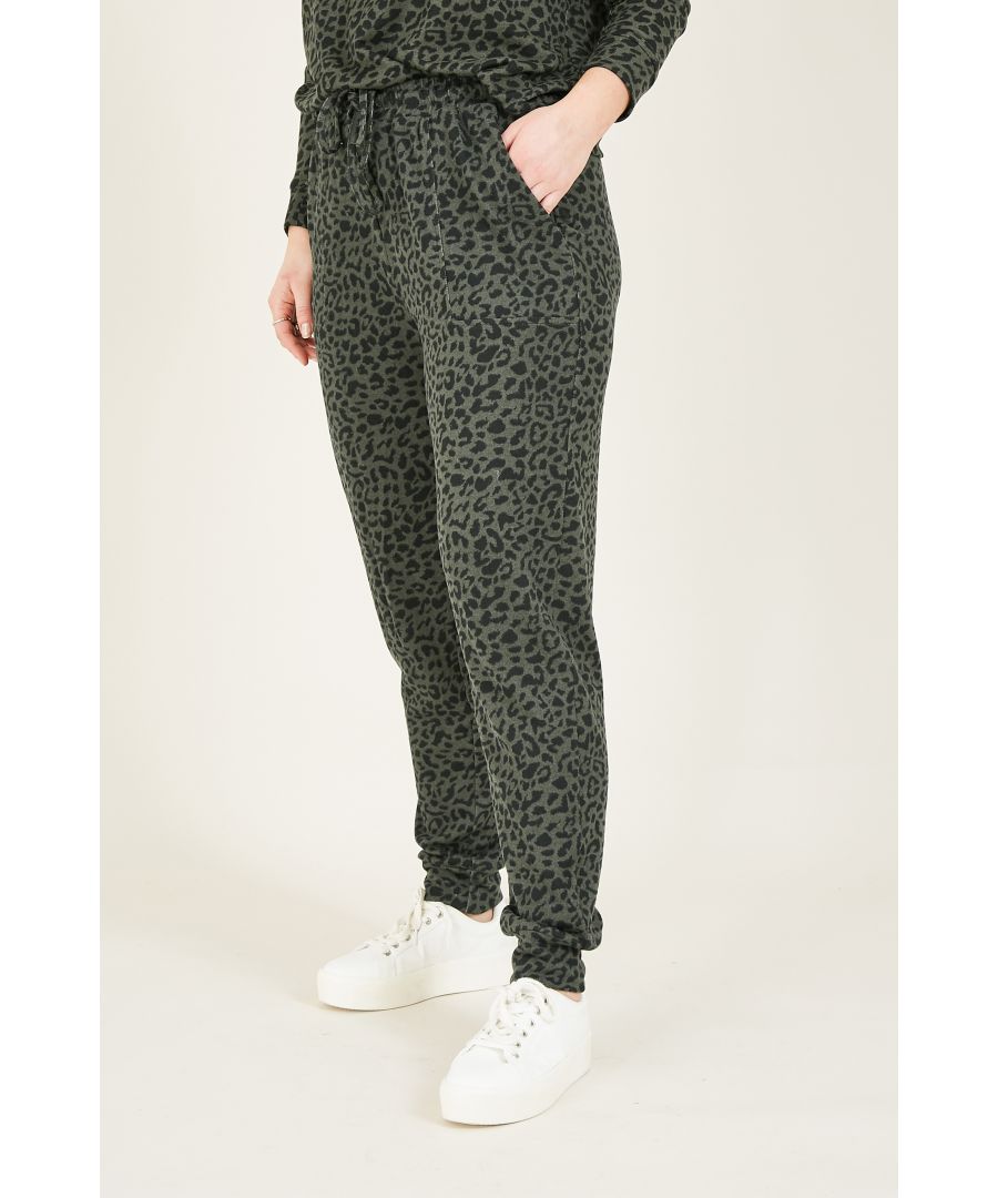 Update your loungewear collection with this Yumi Animal Print Loungewear Joggers. Expertly crafted from soft jersey fabric, they're cut to a tapered shape with a fitetd drawstring waistline. The leopard print adds a modern touch, complemented by cinched cuffs to keep your look on-trend. Pair with the matching co ord sweatshirt for the ultimate cosy finish.  95% Polyester 5% Elastane Machine Wash At 30