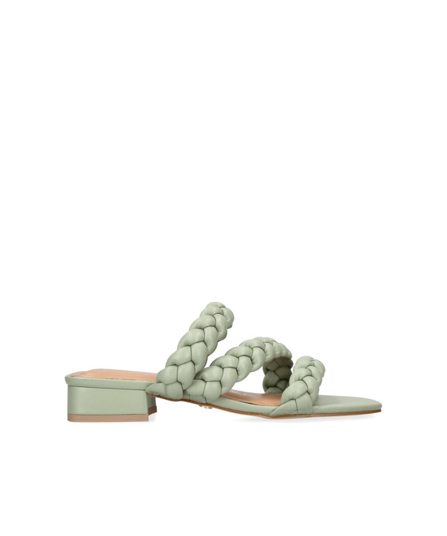 The Sima is a green sandal with low block heel. The straps across the foot are braided in style. There is a small gold KG stud on the outer sole. This product is registered with The Vegan Society.