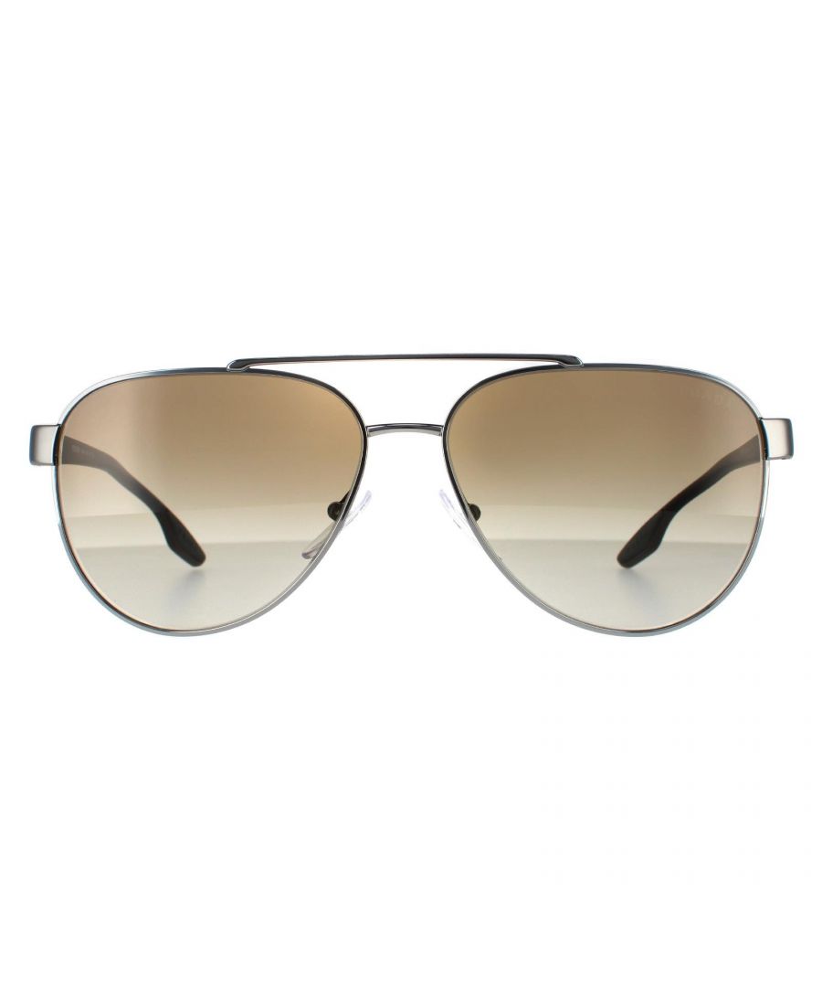 Prada Sport Aviator Mens Gunmetal Green Gradient Sunglasses PS54TS are Italian made classic metal aviator style sunglasses featuring a very fine brow bar. The slimline temples are made from plastic, have rubber inserts at the temple tips for grip and feature the iconic red branded detailing at the hinges.