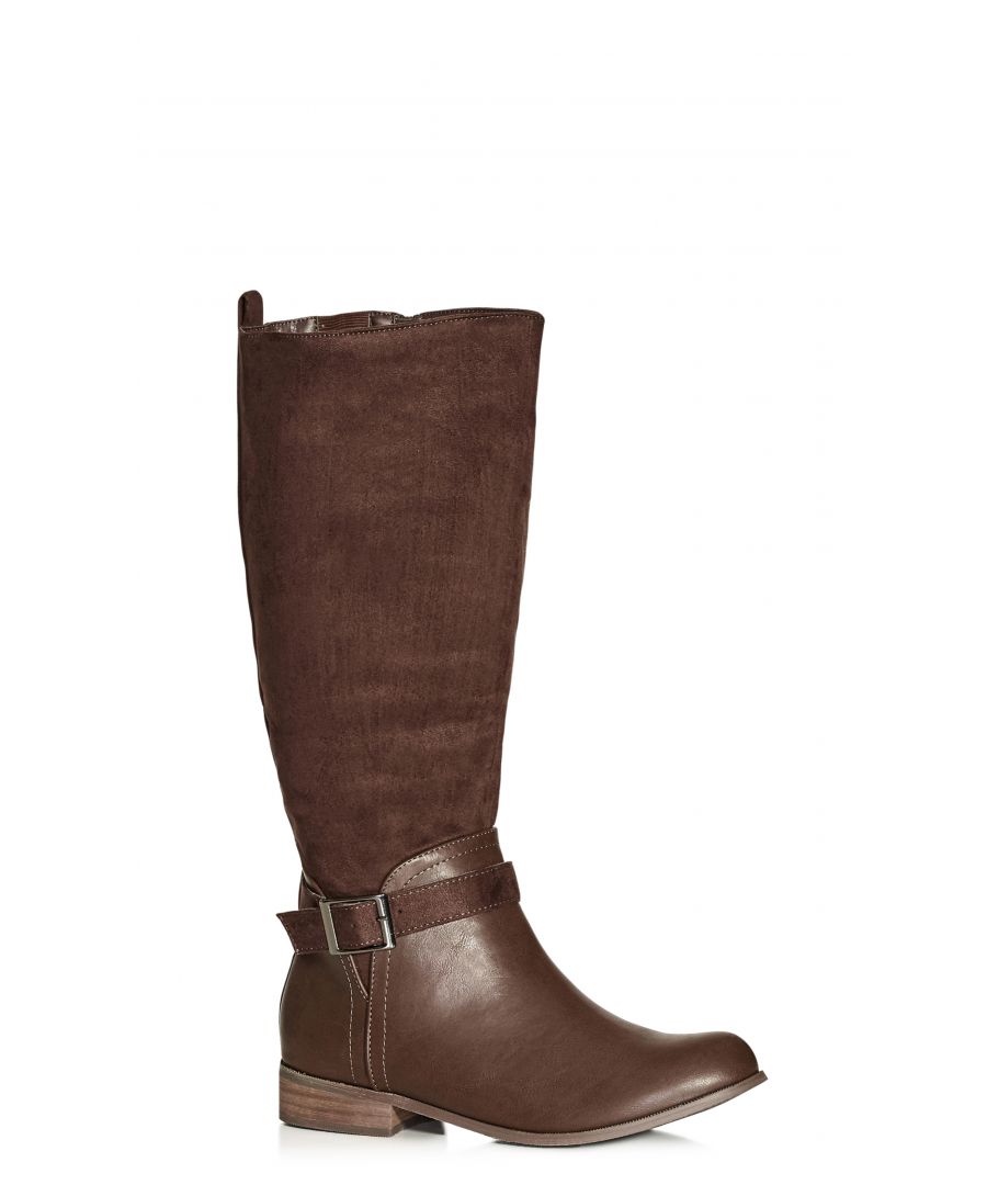 Fashionable & chic, always be perfectly on-trend in the chocolate Micah Knee Boot. Complete with a wide calf fit and cushioned insoles, set trends when you step out in an eye-catching fusion of faux leather & suede. Key Features Include: - Rounded toe tall boot - Wide width fit - Faux leather toe to ankle - Faux suede calf to ankle - Knee high length - Ankle strap & buckle detail - Inner ankle zip opening - Stretch calf panel for the perfect fit - Lightly cushioned sole - Acute wood stacked block heel For a look that works no matter the season, team with tapered skinny jeans and a floaty blouse.