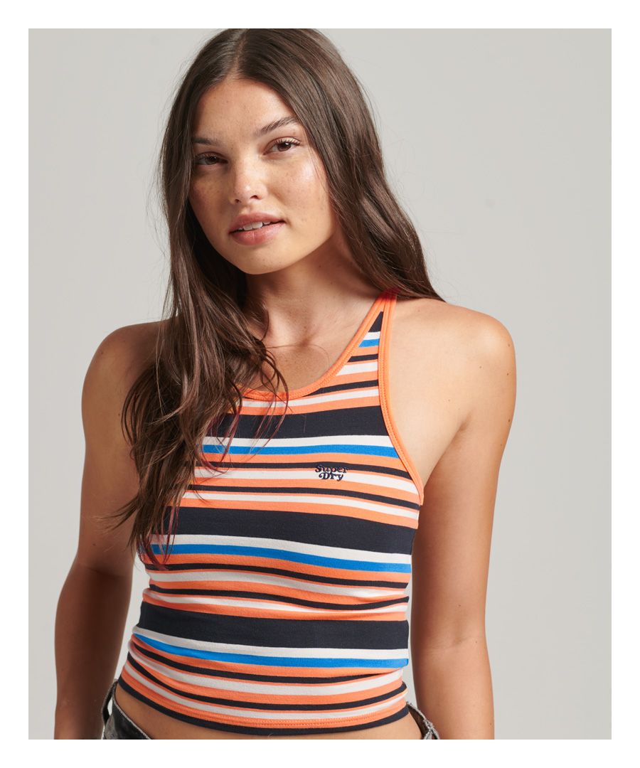 Dress day-to-day like it's the summer of '83. This classic Stripe vest is an iconic staple of Vintage fashion, inspired by the sunny vibes of the Golden State. Light up your casual wardrobe with nostalgia and comfort, all with a contemporary cropped chic.Slim fit – designed to fit closer to the body for a more tailored lookScoop neckSleeveless designStriped designEmbroidered Superdry logo