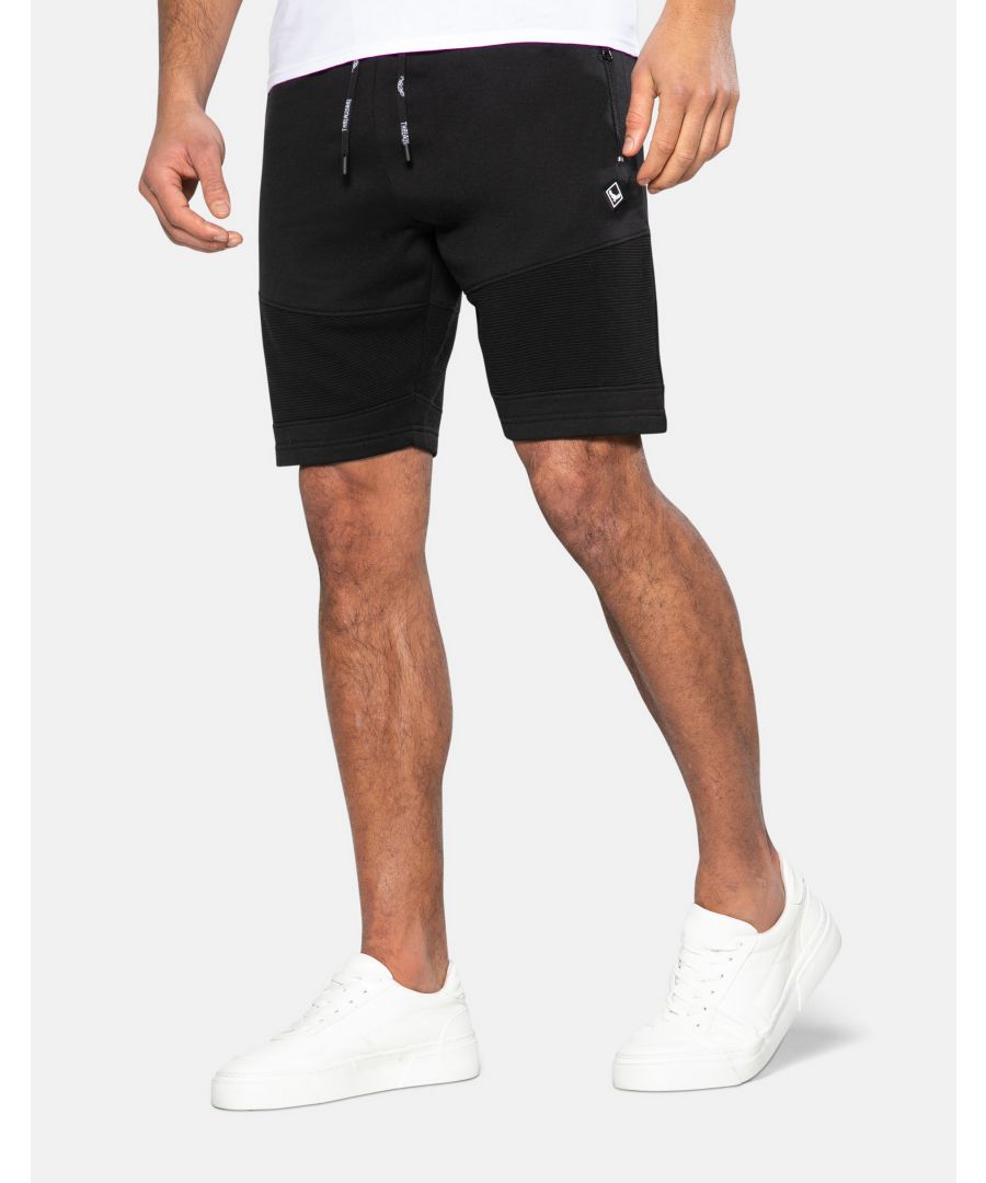 These fleece shorts from Threadbare are made in a soft cotton blend fabric making this a very comfortable style. The shorts feature ribbed panel detail and have an elasticated waistband with a drawstring and side zip pockets. Other colours available.