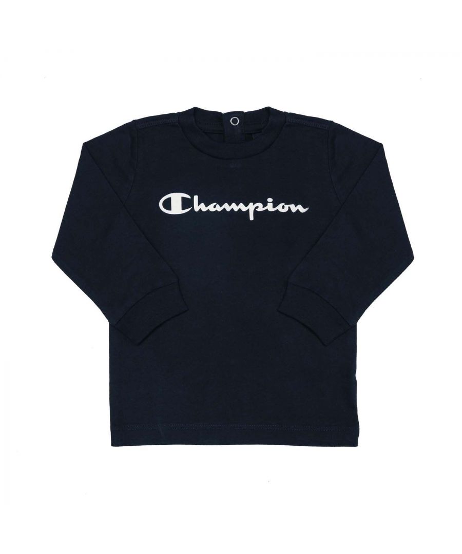Baby Boys Champion Legacy Long Sleeve T- Shirt in navy.- Ribbed crew neck.- Long sleeves.- Snap fastening.- Ribbed cuffs.- C logo embroidered onto sleeve.- Large classic logo print on chest.- 100% Cotton.- Ref:305849BS501IB