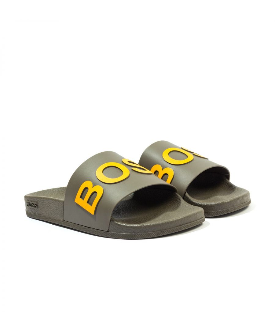 The Bay Contrast Logo Slides from BOSS are a wardrobe staple for anyone. Featuring an ergonomically designed footbed for optimum comfort. Easy to wear, finished with the iconic BOSS logo contrast embossed across the strap. Synthetic Rubber Composition, Ergonomic Designed Footbed, Non Slip Sole, Made in Italy, BOSS Branding.