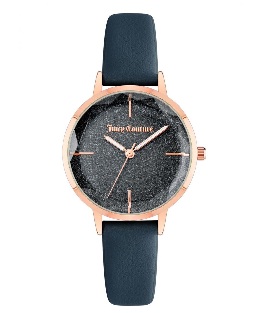 Juicy Couture Watch JC/1326RGNV\nGender: Women\nMain color: Rose Gold\nClockwork: Quartz: Battery\nDisplay format: Analog\nWater resistance: 0 ATM\nClosure: Pin Buckle\nFunctions: No Extra Function\nCase color: Rose Gold\nCase material: Metal\nCase width: 34\nCase length: 34\nFacing: None\nWristband color: Blue\nWristband material: Leatherette\nStrap connecting width: 14\nWrist circumference (max.): 21.5\nShipment includes: Watch box\nStyle: Fashion\nCase height: 9\nGlass: Mineral Glass\nDisplay color: Blue\nPower reserve: No automatic\nbezel: none\nWatches Extra: None