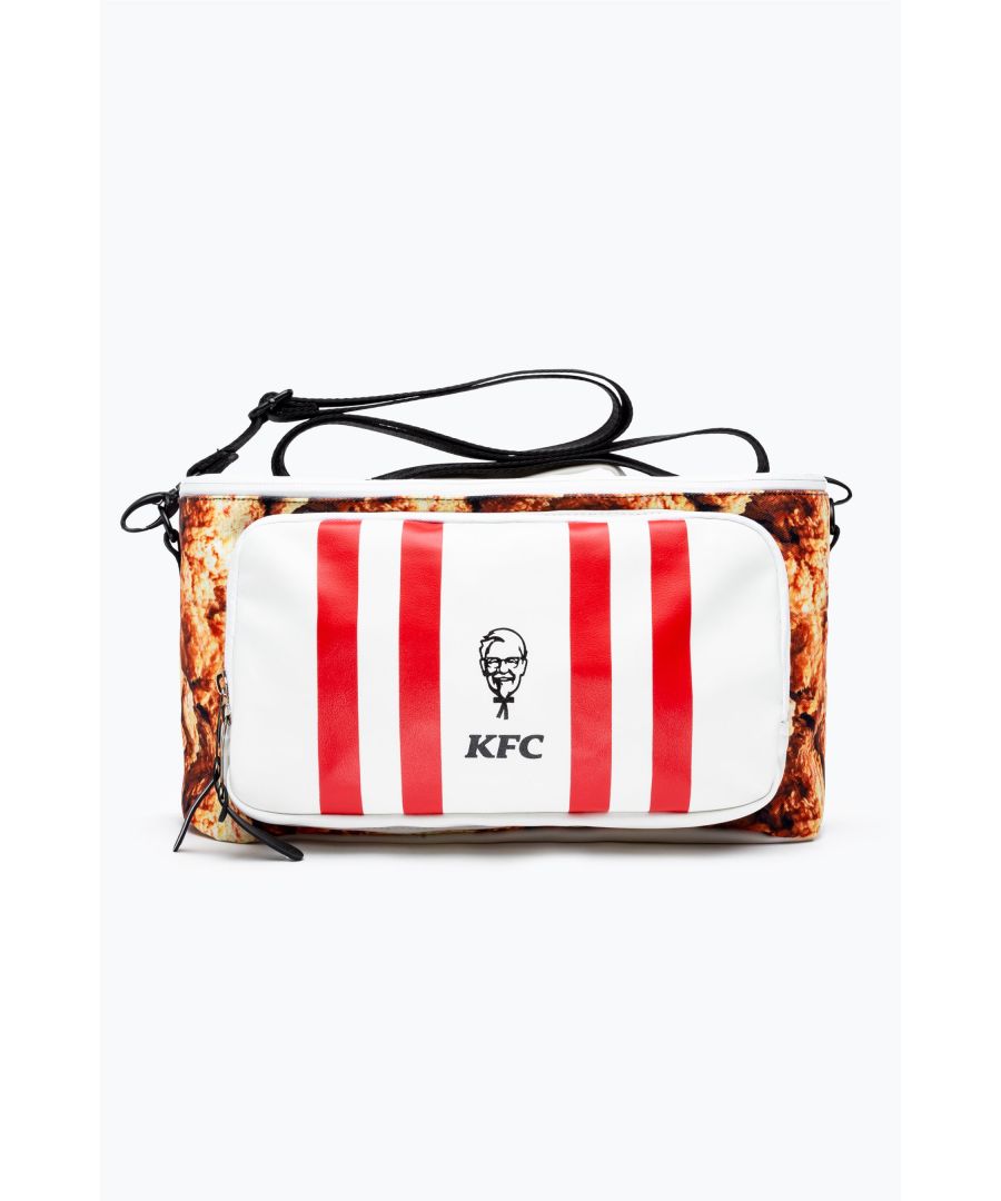 The HYPE X KFC Original Recipe Variety Bag is designed in a cooler bag shape, complete with an inner lining, grab handle, and detachable justhype branded black strap. Made from 40% polyester 40% PVC 20% PU with a 11.5L capacity. Designed in an original recipe print with a white zip lid and KFC branded front pocket. Wipe clean only.