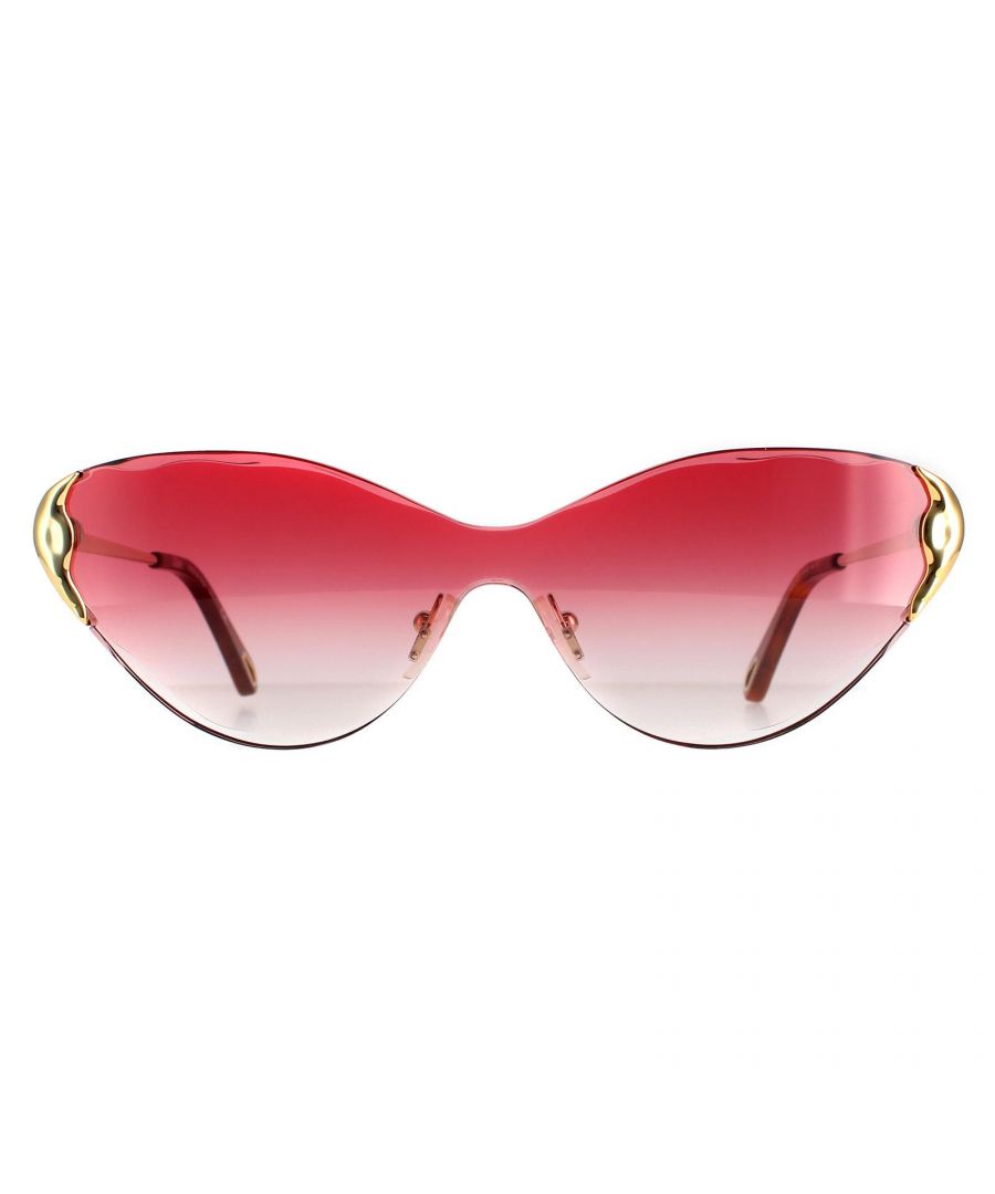Chloe Cat Eye Womens Gold Red Gradient Curtis CE163S Sunglasses are a gorgeous wide style with accentuated cat's eye look. The rimless sculptured lens is just stunning and matched perfectly with the metal temples that complete the top corners.