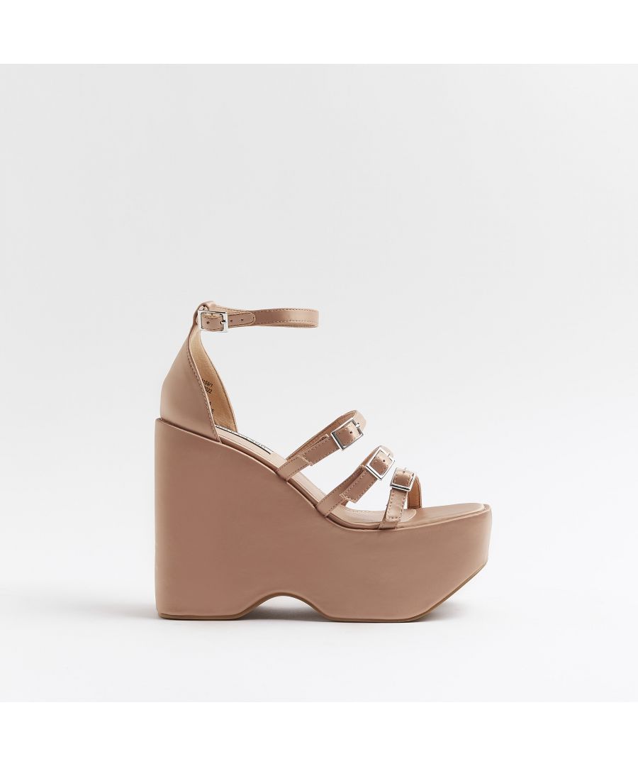 > Brand: River Island> Department: Women> Colour: Pink> Type: Heel> Style: Platform> Material Composition: Upper: PU, Sole: Plastic> Upper Material: PU> Occasion: Casual> Pattern: No Pattern> Season: AW22> Closure: Buckle> Toe Shape: Open Toe> Heel Style: Wedge> Heel Height: Very High (Over 10 cm)