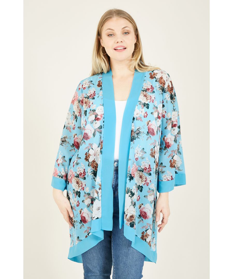 Kick back in this glorious Mela Sky Blue Floral Printed Kimono. With a thick blue trim, this super versatile garment can be accessorized and style for any occasion. We love it over a bodycon. Or, add a flourish of florals to casual attire and throw over jeans and a vest top.  100% Polyester Machine Wash At 30 Length is 99cm-38.9inches