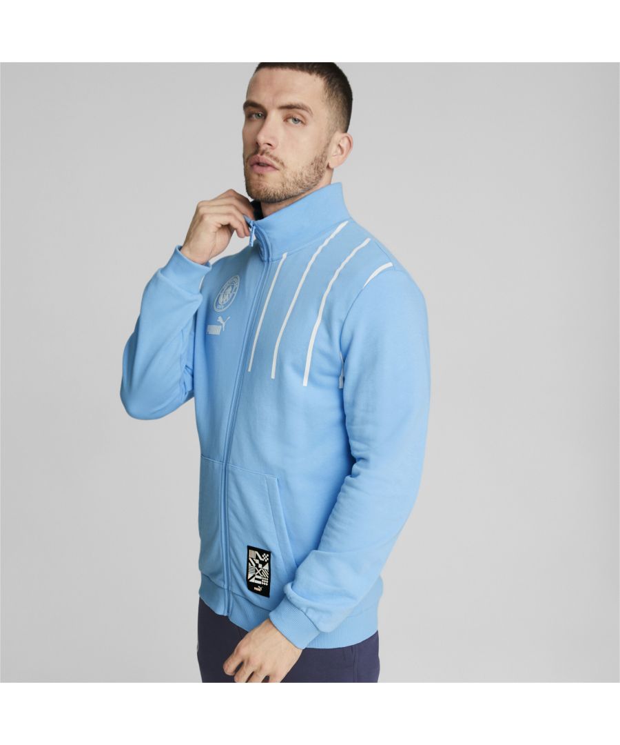 PRODUCT STORY Show your support for Manchester City F.C. in the stands with the ftblCulture track jacket. Along with City’s iconic crest, it has a large graphic inspired by this season’s prematch gear, and a Unified by Diversity patch on the front. FEATURES & BENEFITS : Recycled Content: Made with at least 20% recycled material as a step toward a better future Cotton: Cotton in PUMA products comes from farms with a focus on sustainable farming such as water efficiency and soil health protection. Learn more: https://about.puma.com/forever-better DETAILS : Regular fit French terry jersey Zip closure 3 front pockets PUMA No. 1 Logo and official team crest on the chest Unified by Diversity patch at the hem