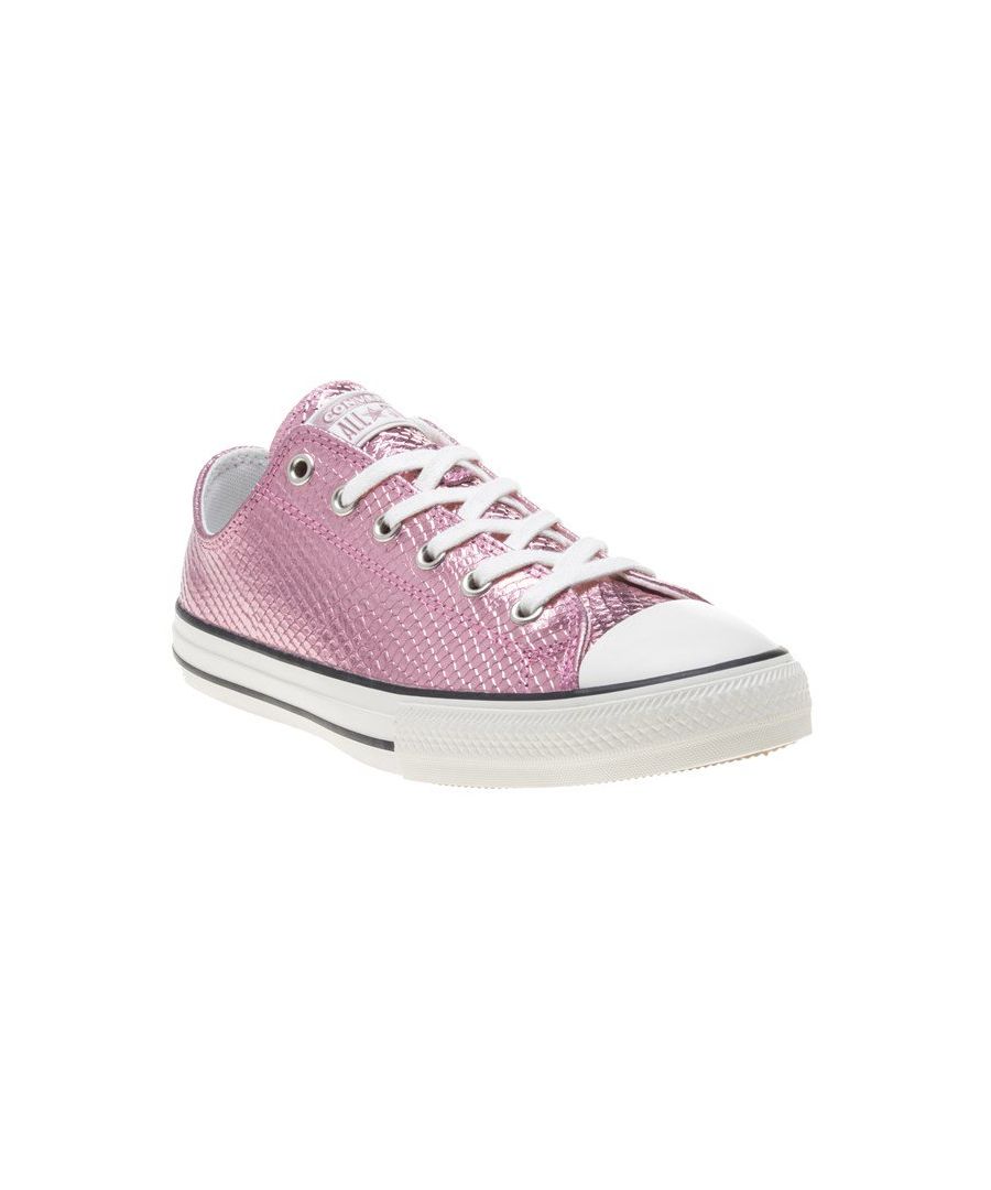 Inject Some Shimmer Into Your Style With The All Star Ox Junior Trainers From Converse. The Shiny Pink Metallic Plimsoll Boasts A Snake Print And Is Complemented With The Brands Iconic Rubber Toe Cap And Vulcanised Sole.