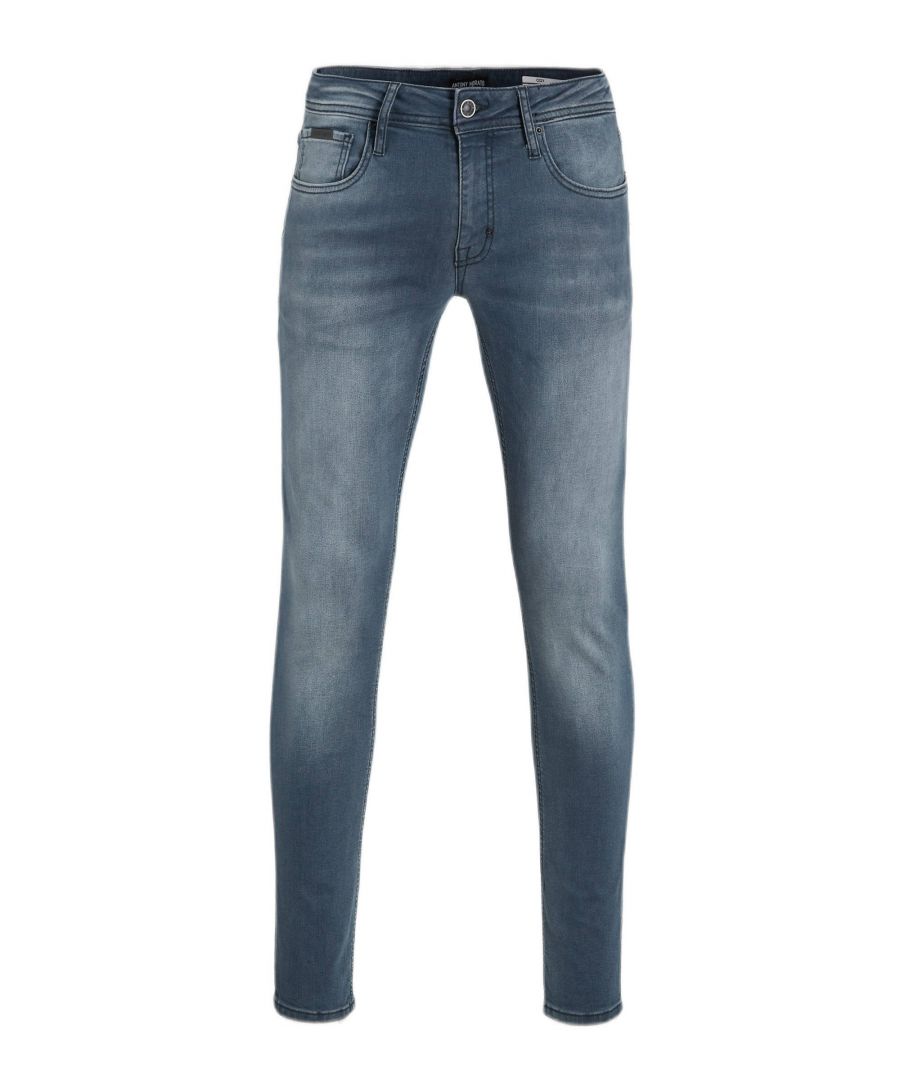 Deze tapered fit jeans voor heren van Antony Morato is gemaakt van stretchdenim. Het 5-pocket model heeft een rits- en knoopsluiting.details van deze jeans:5-pocket