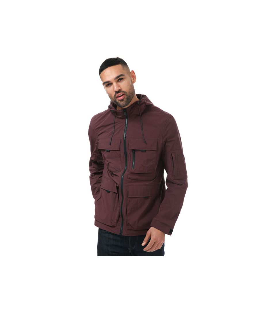 Mens Ted Baker Washon Multi Pocket Hooded Jacket in purple.- Adjustable hood.- Zip fastening.- Large flap pockets with velcro fastening.- Conventional length.- Shell: 100% Polyamide. Trim: 100% Polyester. Machine wash at 30 degrees.- Ref: 253213DPPURPLE