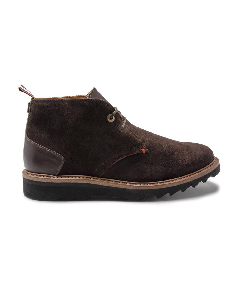 The Mens Rutter Brown Chukka Boots By Simon Carter Are The Perfect Staple Boot To Smarten Up Your Outfits. Crafted In Premium Suede, Featuring Leather Details And An Exclusive Sausage Dog Print Lining.