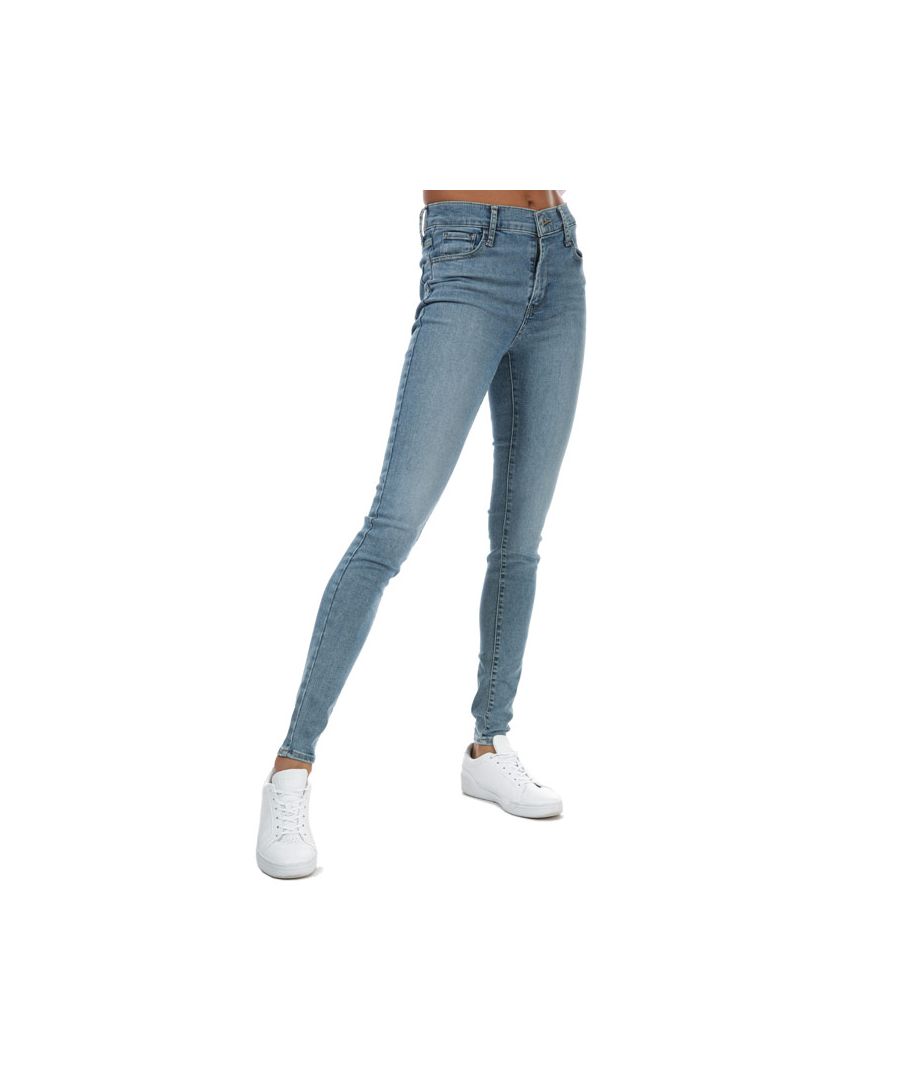 Women's Levi’s 720 High Rise Super Skinny Jeans in velocity squared. Levi’s signature fits are the ultimate look-amazing jeans  designed to flatter  hold and lift — all day  every day.  The 720 High Rise Super Skinny Jean flatters your waist and holds you in with a sleek  comfortable high-rise fit.- Classic 5 pocket styling. - Zip fly and button fastening. - Levi's sculpt with hyper stretch is an advanced blend of Lycra® and cotton fibres for extreme stretch. - Slim through hip and thigh. - High waist - rise = 10in. - Skinny leg = 9in opening.- Super skinny fit. - Extra short inside leg length approx. 28in  Short inside leg length approx. 30in  Regular inside leg length approx. 32in.- 74% Cotton  15% Lyocell  6% Polyester  5% Elastane.  Machine washable.- Ref: 52797-0124. Measurements are intended for guidance only.