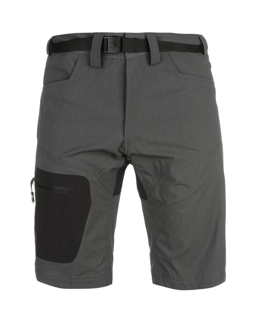 Karrimor Hot Rock Mens Shorts - Elevate your outdoor wear with these Hot Rock Shorts designed for hiking enthusiasts by Karrimor. The shorts have been constructed from lightweight fabric that offer optimal comfort when trekking around the mountains. Featuring a built in belt with clip fastening, button closure to the waist with a zipped fly, two hand pockets, a zipped back pocket and a thigh pocket with zip closure.