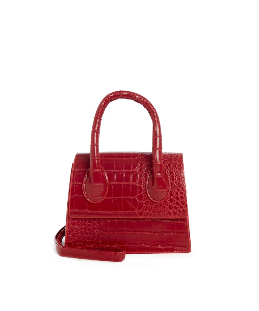 The cross body bag  is made with materials that meet PARIGI quality standards and equipped with a magnet closure to keep your belongings safe and secure. The main compartment is designed to fit all your essentials. With its stylish design, it is suitable for both daily use and special occasions. The comfortable strap and lightweight construction make it an ideal choice for anyone looking for a functional and fashionable cross body bag.\n\nOuter Fabric Material: PVC\nLining Material: -\nHandle Material: PVC\nStrap Material: PVC\nClosure Type: Magnet\nMax. Strap Length (cm): 113\nCompartments: Main compartment