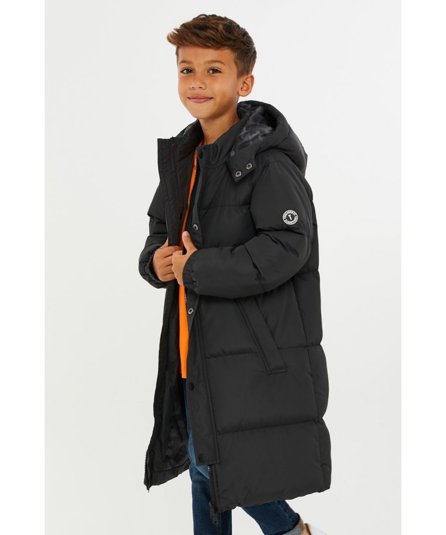 This longline hooded, padded jacket from Threadboys features a two-way zip and popper fastenings. The jacket also has two side pockets, elasticated cuffs, and branded badge on the sleeve. Perfect for keeping warm this back-to-school season, other colours and styles are also available.