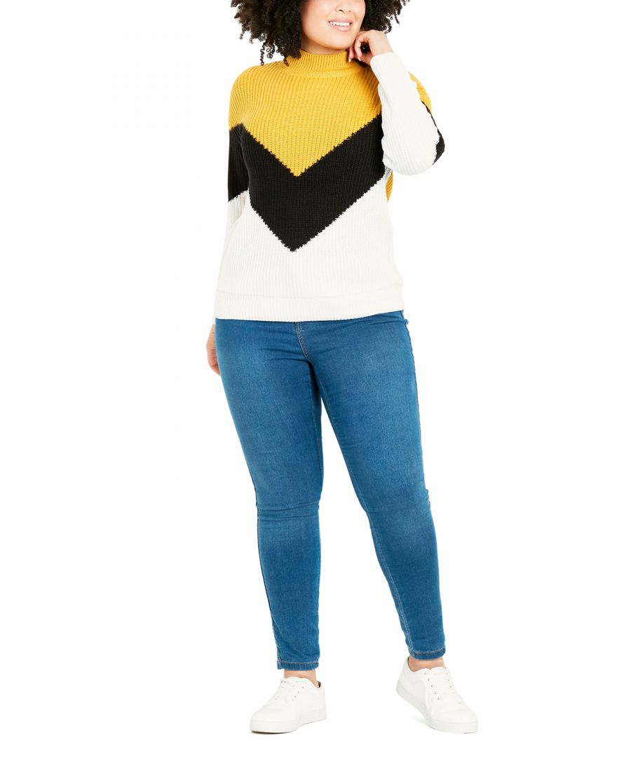 Style your laidback looks with the Chevron Colour Block Jumper. Crafted in a soft stretch fabrication, feel warm and comfortable in this must-have jumper. Key Features Include: -High neckline -Long sleeve -Below hip hemline -Chevron colour block design -Pull over fit -Ribbed knit -Soft stretch fabrication