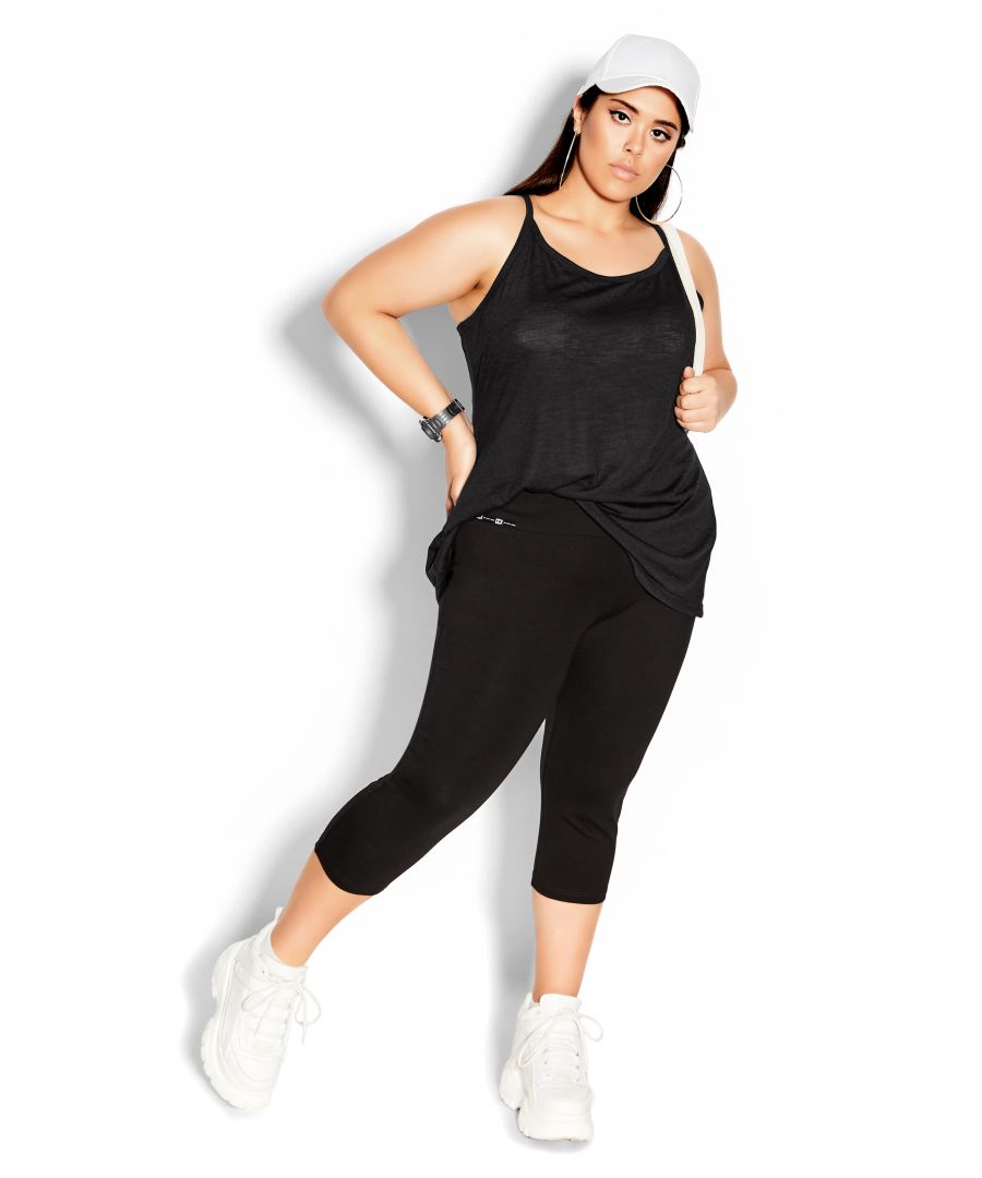 Amp up your activewear this season with the CCX Strappy Tank. Perfect for the incoming summer swelter, this tank top showcases a scooped neckline with a branded banding to the back for a unique and edgy finish that is bound to turn heads! Key Features Include: - Scoop neckline - Sleeveless - Elasticated back banding - Relaxed fit - Pull-over style - Hip length hemline - Stretch fabrication Finish off your look by pairing this tank with your best activewear tights for an on-the-go look.