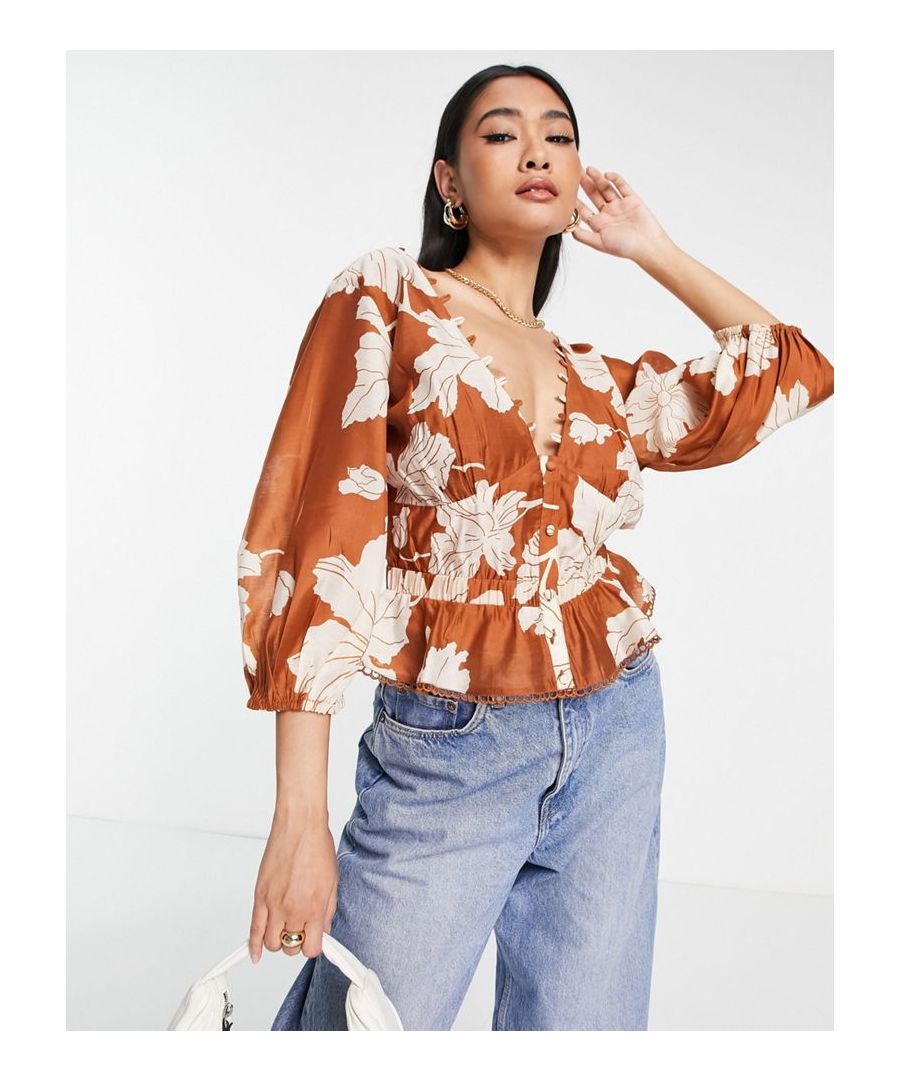 Top by ASOS DESIGN Waist-up dressing Plunge neck Button placket Cut-out and elasticated detail Peplum hem Regular fit  Sold By: Asos