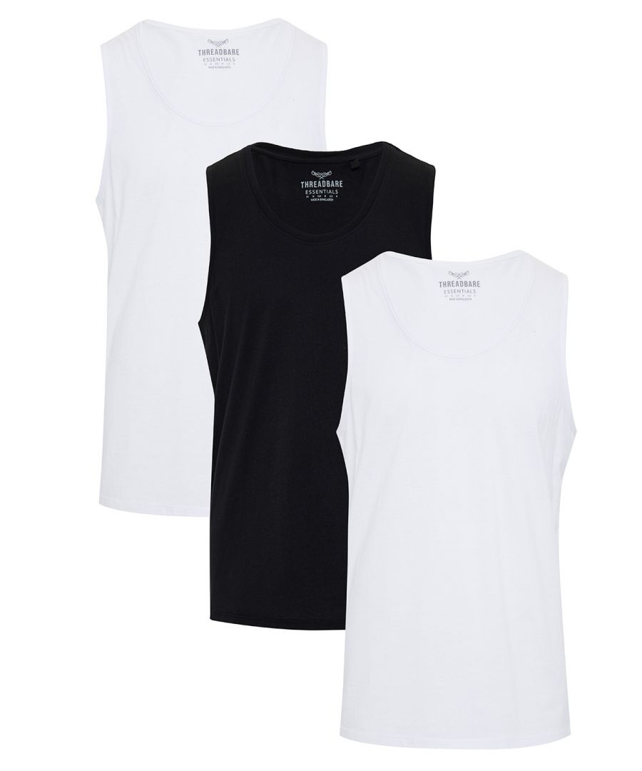Get back to basics with this three pack of essential t-shirt vests. With a relaxed neckline and armholes for that off-duty traditional vest styling, these essential vests are perfect for down days and double up as loungewear. \nCut in a regular fit, these sleeveless t-shirt vests are made from a cotton rich blend fabric. Perfect with joggers at home, under knitwear as a thermal layer, or with your pyjama bottoms or shorts for cosy nightwear.