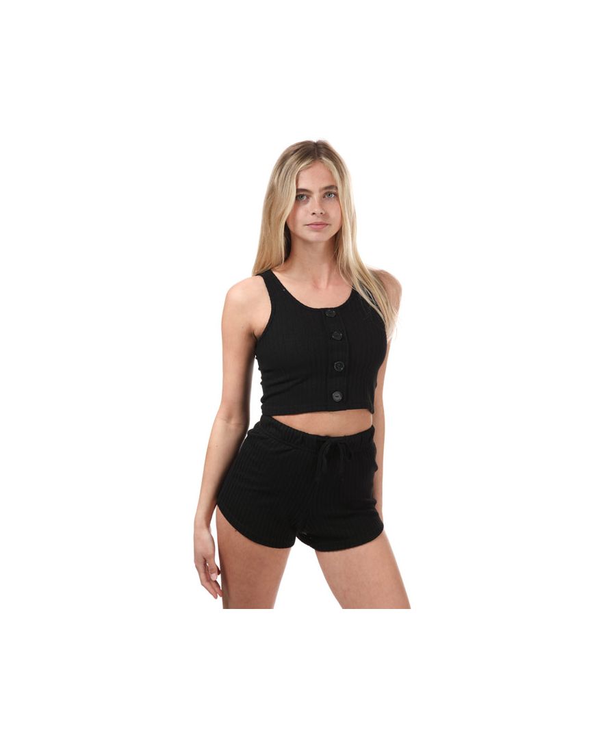 Womens Brave Soul Lounge Set in black.Top:- Scoop neck.- Full button placket.- Sleeveless.- Cropped length.- Allover rib design.- Measurement from shoulder to hem: 17“ approximately.  Shorts:- Elasticated waist with drawcord.- High-rise.- Allover rib design.- Inside leg length measures 2.5 inch approximately.- 62% Polyester  34% Viscose  4% Elastane.  Machine washable.- Ref: LPJ-533NAOMIDMeasurements are intended for guidance only.  Please note this style is sold as a set.  Returns will only be accepted if both items are returned together.