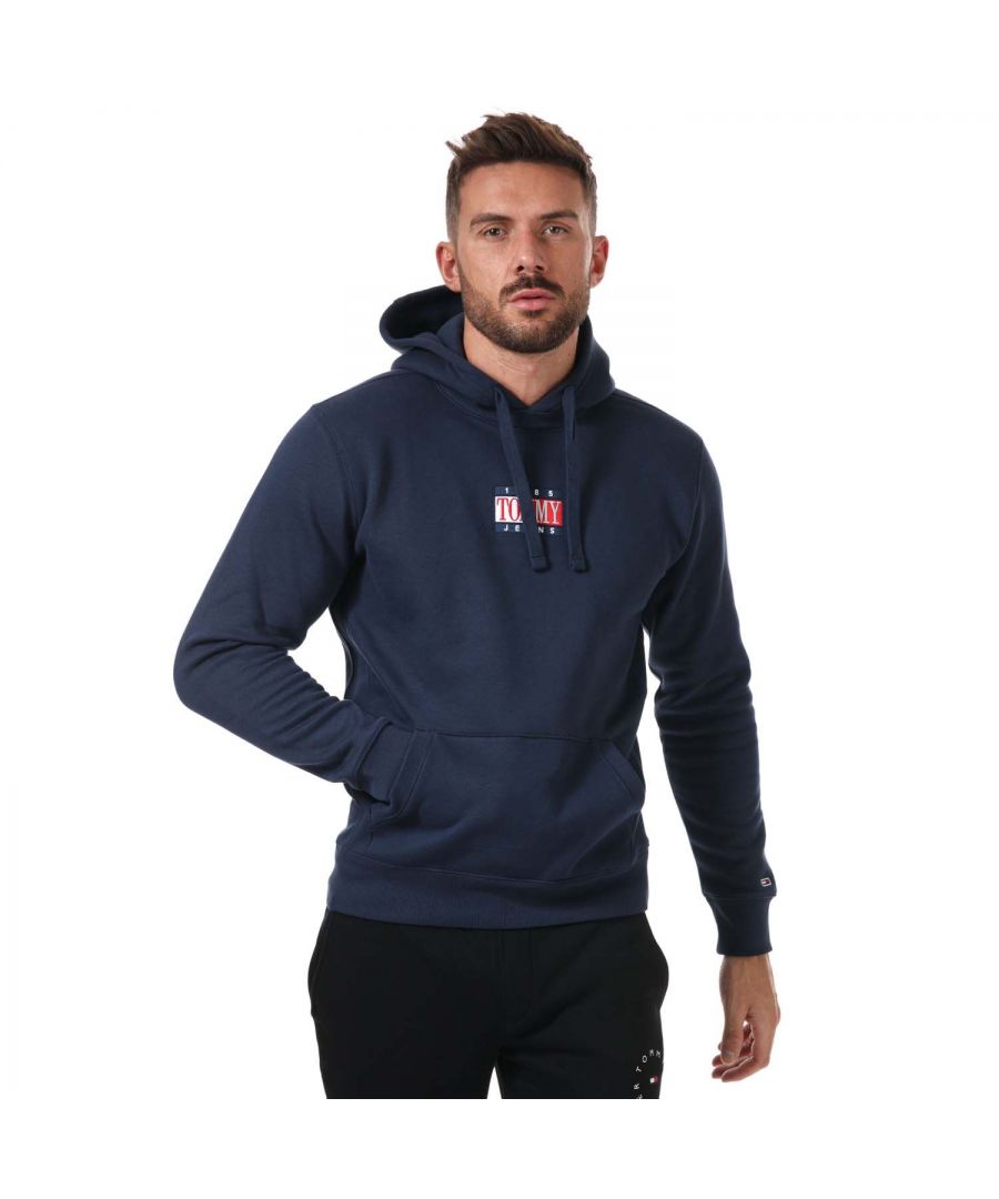 Mens Tommy Hilfiger Timeless Logo Hoody in navy.- Drawstring hood.- Long sleeves.- Kangaroo pocket.- Ribbed cuffs and hem. - Tommy Jeans branding embroidered to the chest.- Regular fit.- Shell: 60% Cotton  40% Polyester. Rib Part: 95% Cotton  5% Elastane.- Ref: DM0DM12372C87