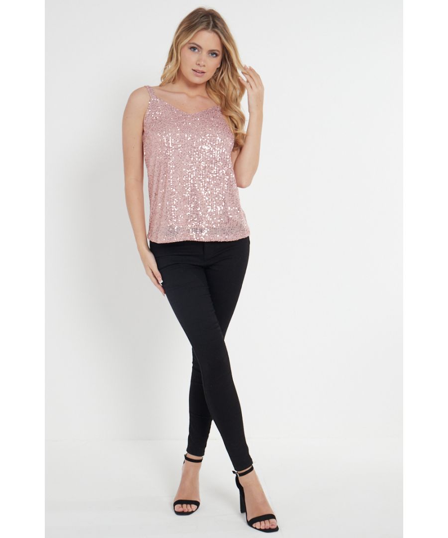 A timeless piece you can add to your wardrobe! If you're looking to refresh your wardrobe staples, this Sequin V neck Cami Top is the way to go. This cami top is the flexible piece every girl needs, whether it's for a chic and striking party look or for a more casual with jeans or your favorite skirt and cardigan.