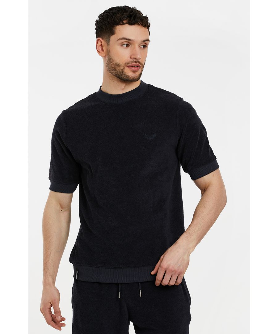 This short sleeve sweatshirt from Threadbare is designed in a soft towelling fabric and is finished with ribbed neck, cuff and hem. Wear with matching towelling shorts or with jeans or casual shorts.