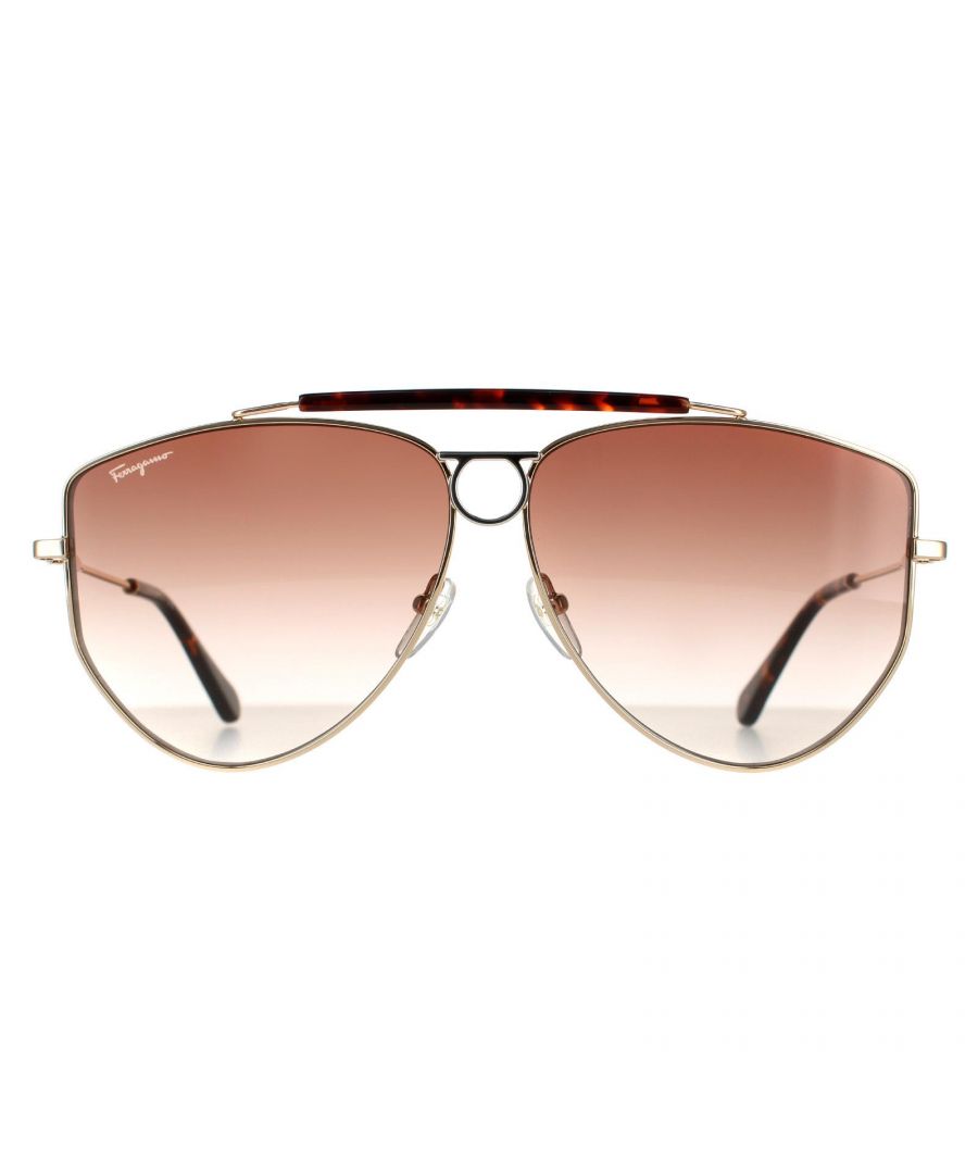 Salvatore Ferragamo Aviator Womens Yellow Gold Brown Gradient Sunglasses SF241S are an aviator design crafted from lightweight metal. The double bridge, silicone nose pads and plastic temple tips ensure an all day snug fit. Slender temples are engraved with the Ferragamo logo for brand authenticity.