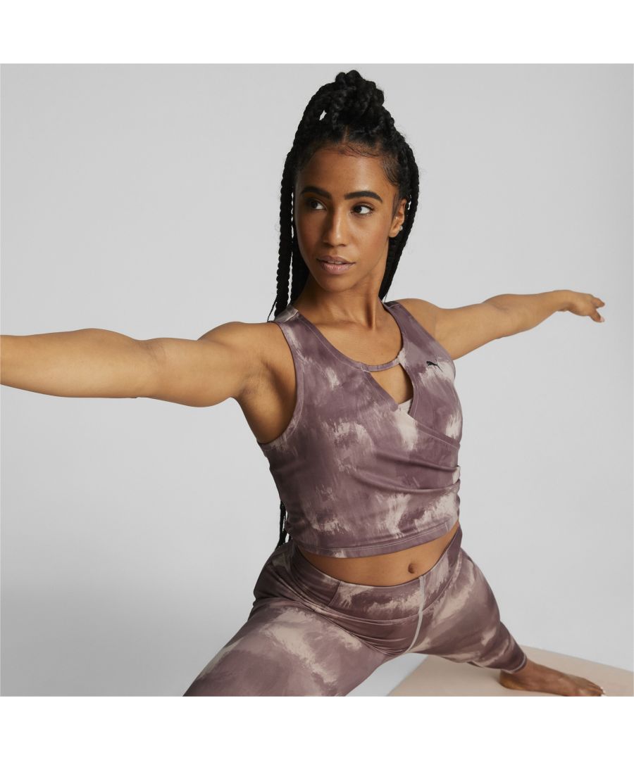 PRODUCT STORY Look as good as your training makes you feel in this crop top from the Studio range. A dreamy all-over print and cool keyhole design detail keep you on trend, while PUMA’s dryCELL moisture-wicking properties work hard to keep you as comfortable as can be through your workout session. FEATURES & BENEFITS Recycled Content: Made with at least 20% recycled material as a step toward a better futuredryCELL: Performance technology designed to wick moisture from the body and keep you free of sweat during exercise DETAILS Keyhole detail on frontAll-over printPUMA Cat Logo on left chest