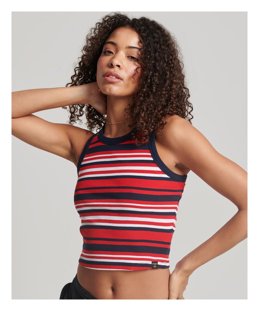 Our Stripe Rib Racer Vest top is an iconic way to elevate your style. A classic piece with a contemporary cut-out chic, it embodies a playful retro vibe that brings personality to your everyday wear.Slim fit – designed to fit closer to the body for a more tailored lookRibbed materialCropped lengthCrew neckCut out back
