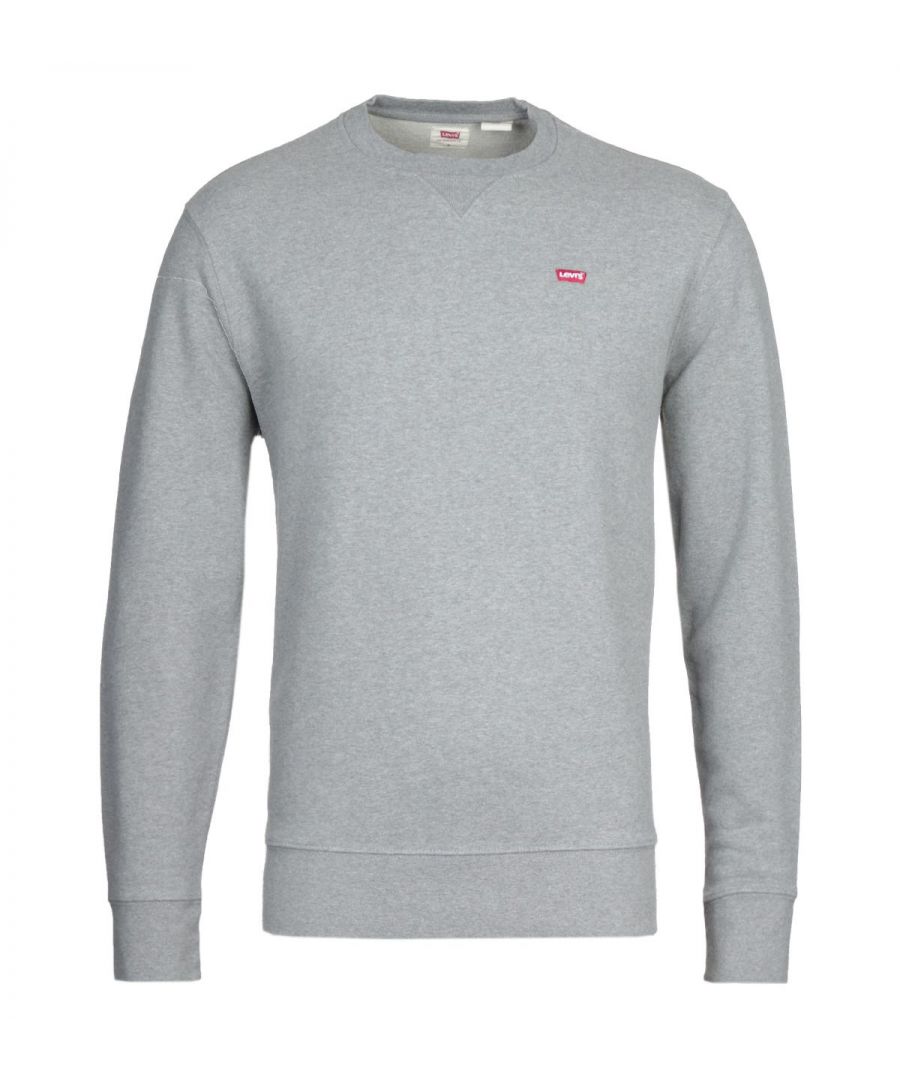 Responsibly made, this timeless crew neck sweatshirt from Levi's is crafted from pure BCI cotton in a French terry construction, providing comfort and versatility. Cut to a regular fit for an effortless style. Featuring a ribbed crew neck with a V-neck insert and ribbed trims. Finished with the iconic Levi's Logo embroidered at the chest. BCI - By buying BCI cotton products, you're supporting more responsibly grown cotton through the Better Cotton Initiative. Regular Fit Sustainably Sourced BCI Cotton French Terry Ribbed Crew Neck V-Neck Insert Ribbed Cuffs & Hemline Levi's Branding Style & Fit: Regular Fit Fits True to Size Composition & Care: 100% Cotton Machine Wash.