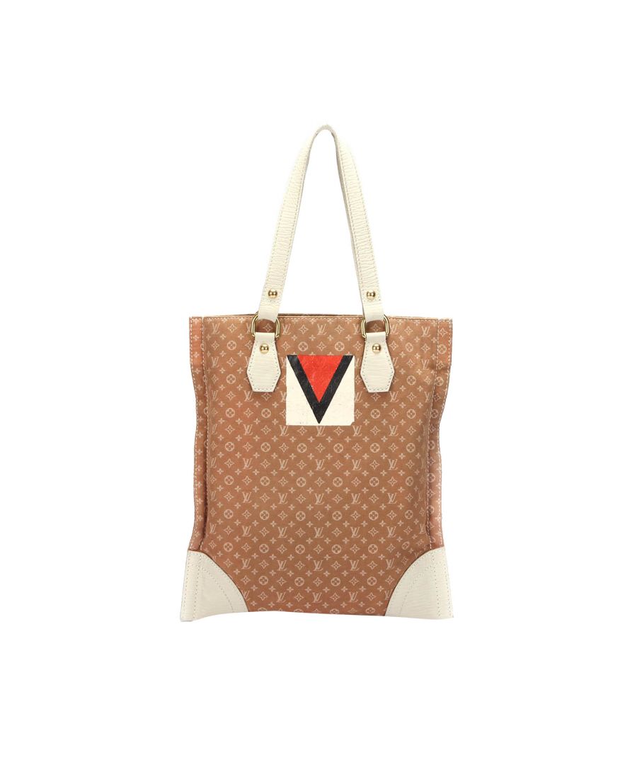 VINTAGE. RRP AS NEW. The Tanger Tote features a mini lin canvas body, flat leather straps, an open top, and an interior zip pocket.Exterior front is discolored. Exterior front is scratched. Interior lining has loose stitching.\n\nDimensions:\nLength 38cm\nWidth 35cm\nDepth 0.5cm\nShoulder Drop 26cm\n\nOriginal Accessories: This item has no other original accessories.\n\nSerial Number: TH0045\nColor: Brown x Light Brown x White\nMaterial: Fabric x Canvas x Leather x Calf\nCountry of Origin: France\nBoutique Reference: SSU119464K1342\n\n\nProduct Rating: GoodCondition\n\nCertificate of Authenticity is available upon request with no extra fee required. Please contact our customer service team.