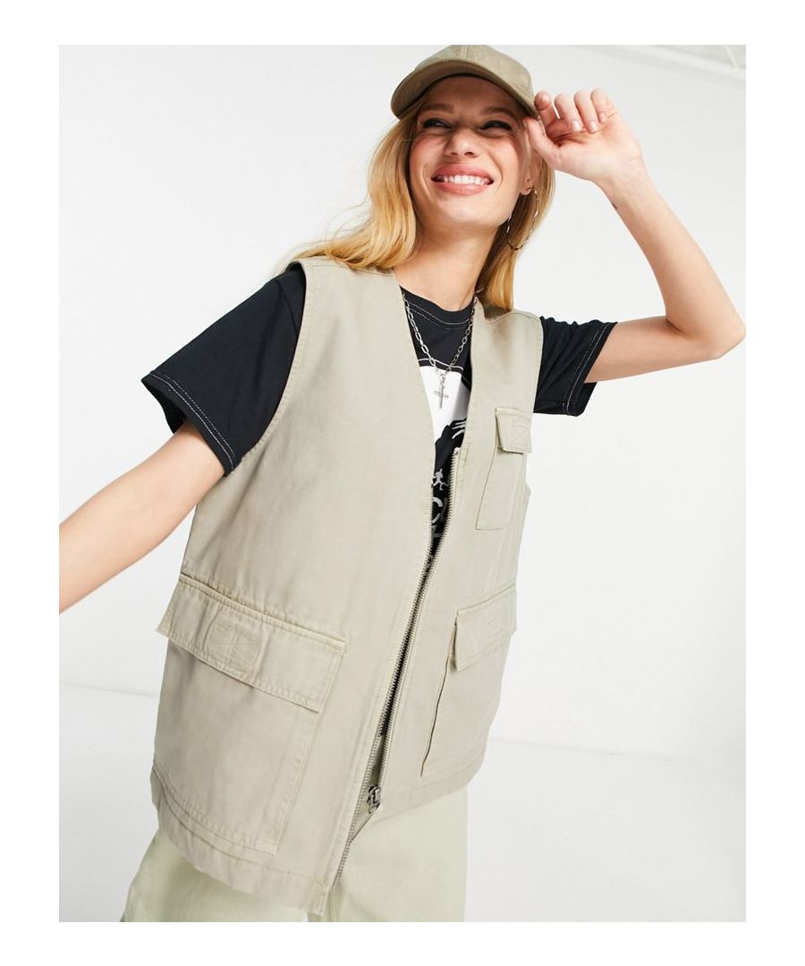 Gilet by Topshop Layer up V-neck Zip fastening Sleeveless style Functional pockets Oversized fit Sold by Asos