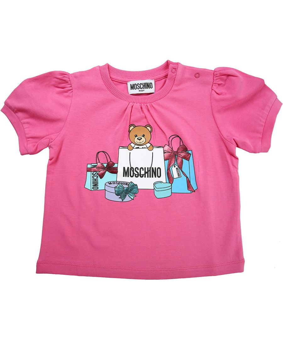 This Moschino Baby Girls Teddy and Gifts Print T-shirt in Pink is crafted from cotton and features a round neckline, a straight hem, short balloon sleeves and a contrasting Moschino Teddy and bags print logo.\n• Stretch cotton fabric• Basic model• Round neckline• Contrasting Moschino Teddy bags logo• Short balloon sleeves• Straight hem