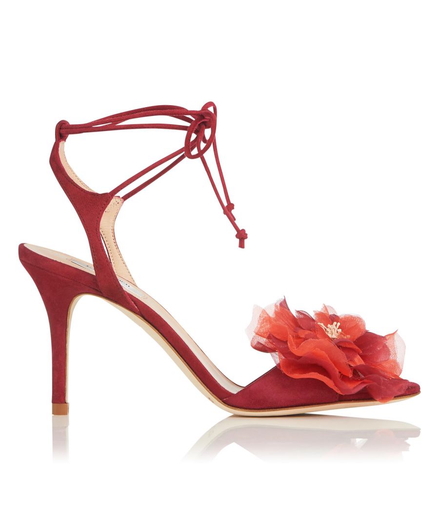 Add a feminine touch to your invite-only look with Scarlet, a blooming summer sandal dressed with beautiful satin flowers. Designed in a vibrant red finish with a sweet strap tie, these statement heels will add a touch of summer to every outfit.