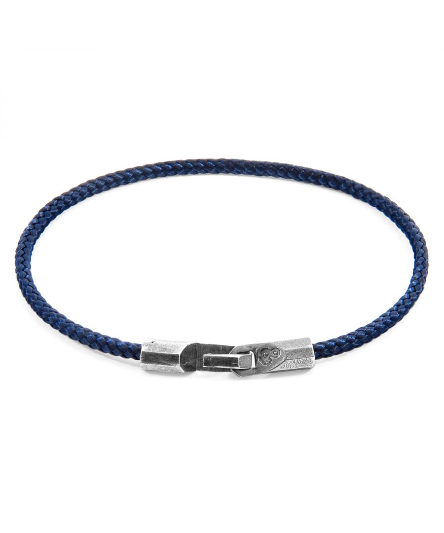 The Navy Blue Talbot Silver and Rope Bracelet was both designed and skilfully handcrafted completely in Great Britain, In Quality We Trust. For the Modern Journeyman (and woman), ANCHOR & CREW takes ownership of an exploratory lifestyle and enjoys the Happy-Good Life. Combining British craft manufacturing with a discerning modern-minimalist style, this ANCHOR & CREW bracelet features:\n\n3mm diameter performance Marine Grade polyester and nylon rope (GB) \nSecure solid .925 sterling silver facetted barrel clasp and hook (GB)\n\nSIZING\nThis bracelet is available in four bracelet lengths, 17cm, 19cm, 21cm or 23cm in circumference. To take the bracelet on or off your wrist, simply slide the hook over the facetted barrel clasp and secure.