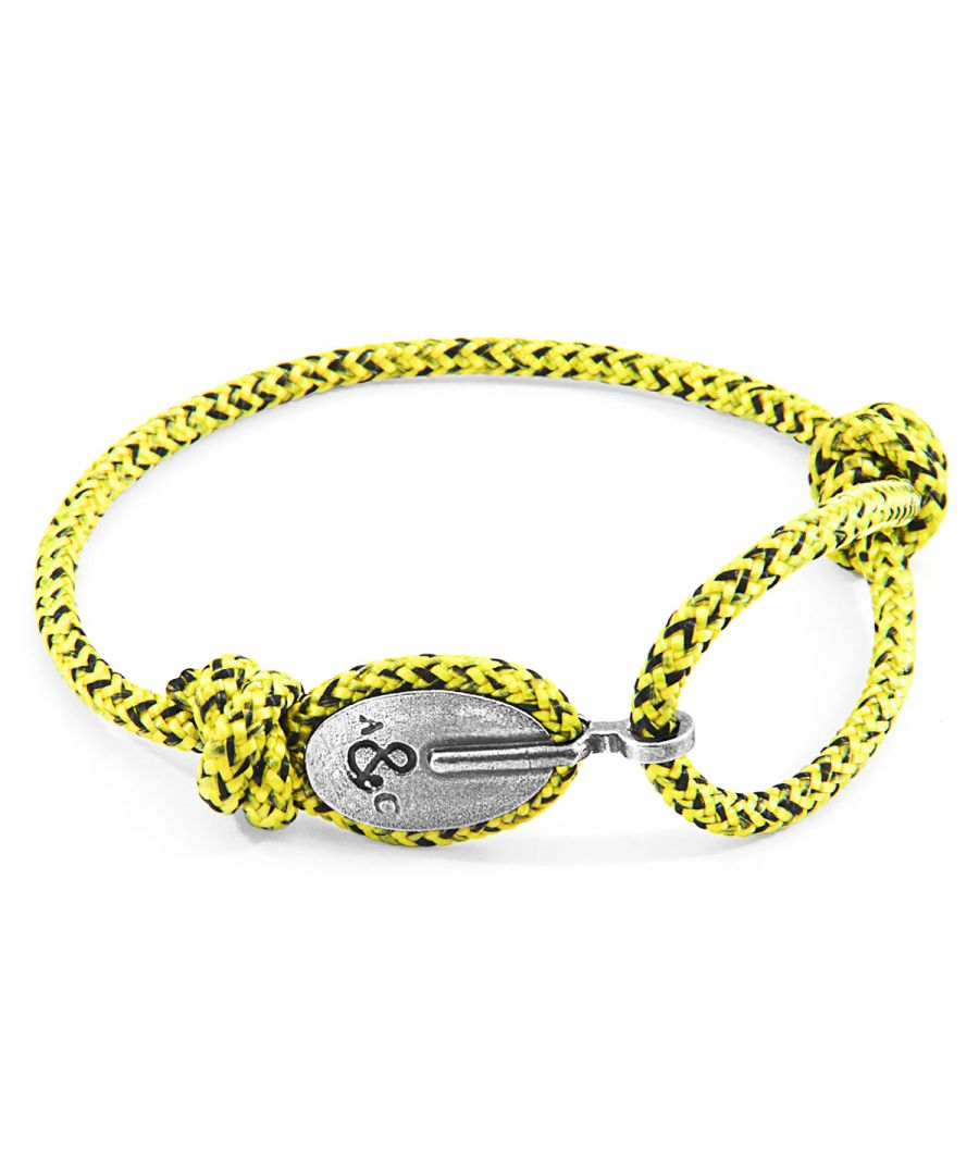 The Yellow Noir London Silver and Rope Bracelet was both designed and skilfully handcrafted completely in Great Britain, In Quality We Trust. For the Modern Journeyman (and woman), ANCHOR & CREW takes ownership of an exploratory lifestyle and enjoys the Happy-Good Life. Combining British craft manufacturing with a discerning modern-minimalist style, this ANCHOR & CREW bracelet features:\n\n3mm diameter performance Marine Grade polyester and nylon rope (GB) \nSecure solid .925 sterling silver pulley (GB) \n\nSIZING\nThis bracelet is one size fits all, with the rope able to extend or tighten to suit your wrist size. To take the bracelet on or off your wrist, simply slide the one adjustable knot around the rope to make the loop size smaller or larger.