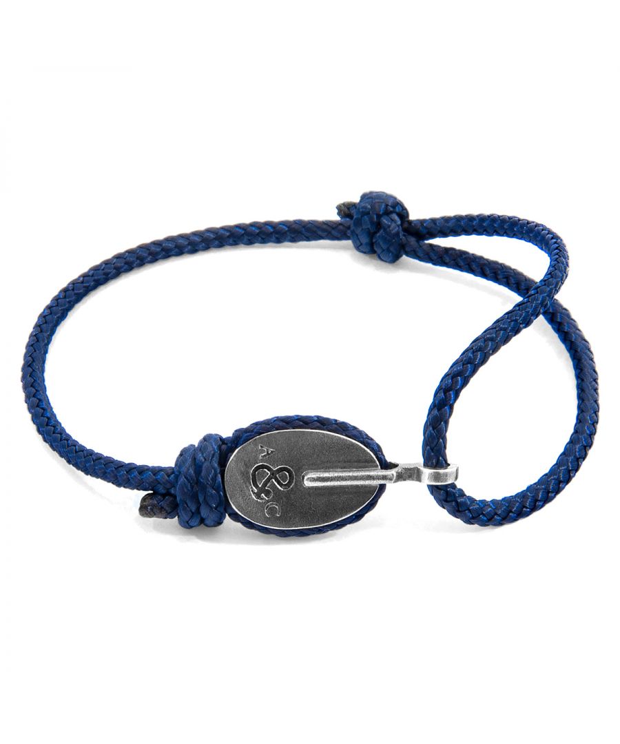 The Navy Blue London Silver and Rope Bracelet was both designed and skilfully handcrafted completely in Great Britain, In Quality We Trust. For the Modern Journeyman (and woman), ANCHOR & CREW takes ownership of an exploratory lifestyle and enjoys the Happy-Good Life. Combining British craft manufacturing with a discerning modern-minimalist style, this ANCHOR & CREW bracelet features:\n\n3mm diameter performance Marine Grade polyester and nylon rope (GB) \nSecure solid .925 sterling silver pulley (GB) \n\nSIZING\nThis bracelet is one size fits all, with the rope able to extend or tighten to suit your wrist size. To take the bracelet on or off your wrist, simply slide the one adjustable knot around the rope to make the loop size smaller or larger. Less is More.