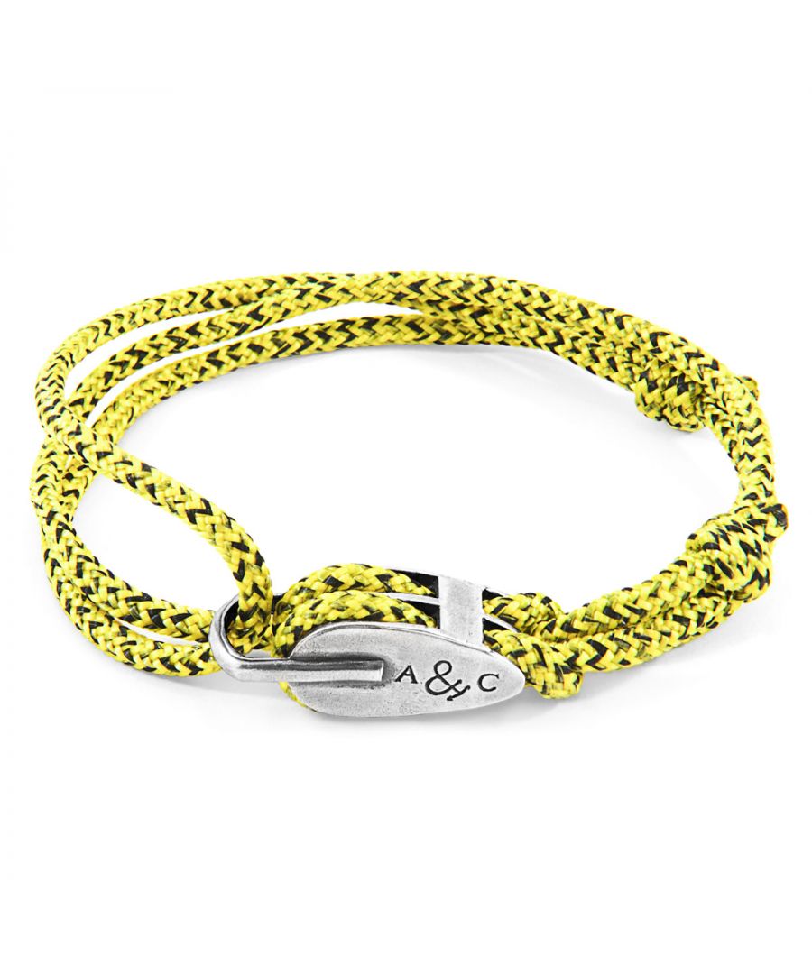 The Yellow Noir Tyne Silver and Rope Bracelet was both designed and skilfully handcrafted completely in Great Britain, In Quality We Trust. For the Modern Journeyman (and woman), ANCHOR & CREW takes ownership of an exploratory lifestyle and enjoys the Happy-Good Life. Combining British craft manufacturing with a discerning modern-minimalist style, this ANCHOR & CREW bracelet features:\n\n3mm diameter performance Marine Grade polyester and nylon rope (GB) \nSecure solid .925 sterling silver oversized pulley (GB) \n\nSIZING\nThis bracelet is one size fits all, with the rope able to extend or tighten to suit your wrist size. To take the bracelet on or off your wrist, simply slide the one adjustable knot around the rope to make the loop size smaller or larger. The rope adjusts itself by feeding freely through the large bar of the pulley clasp.